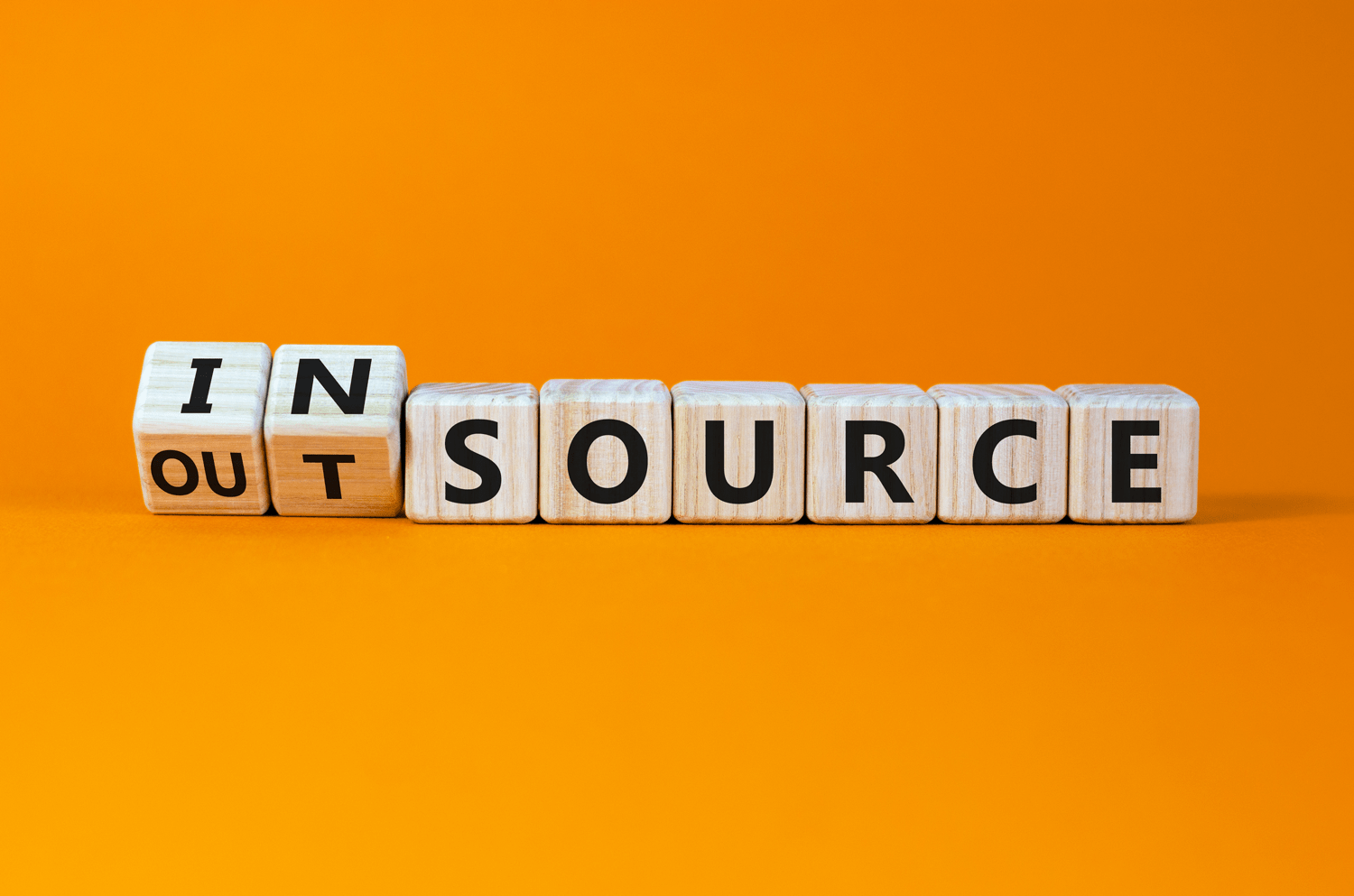 in-house versus outsourcing